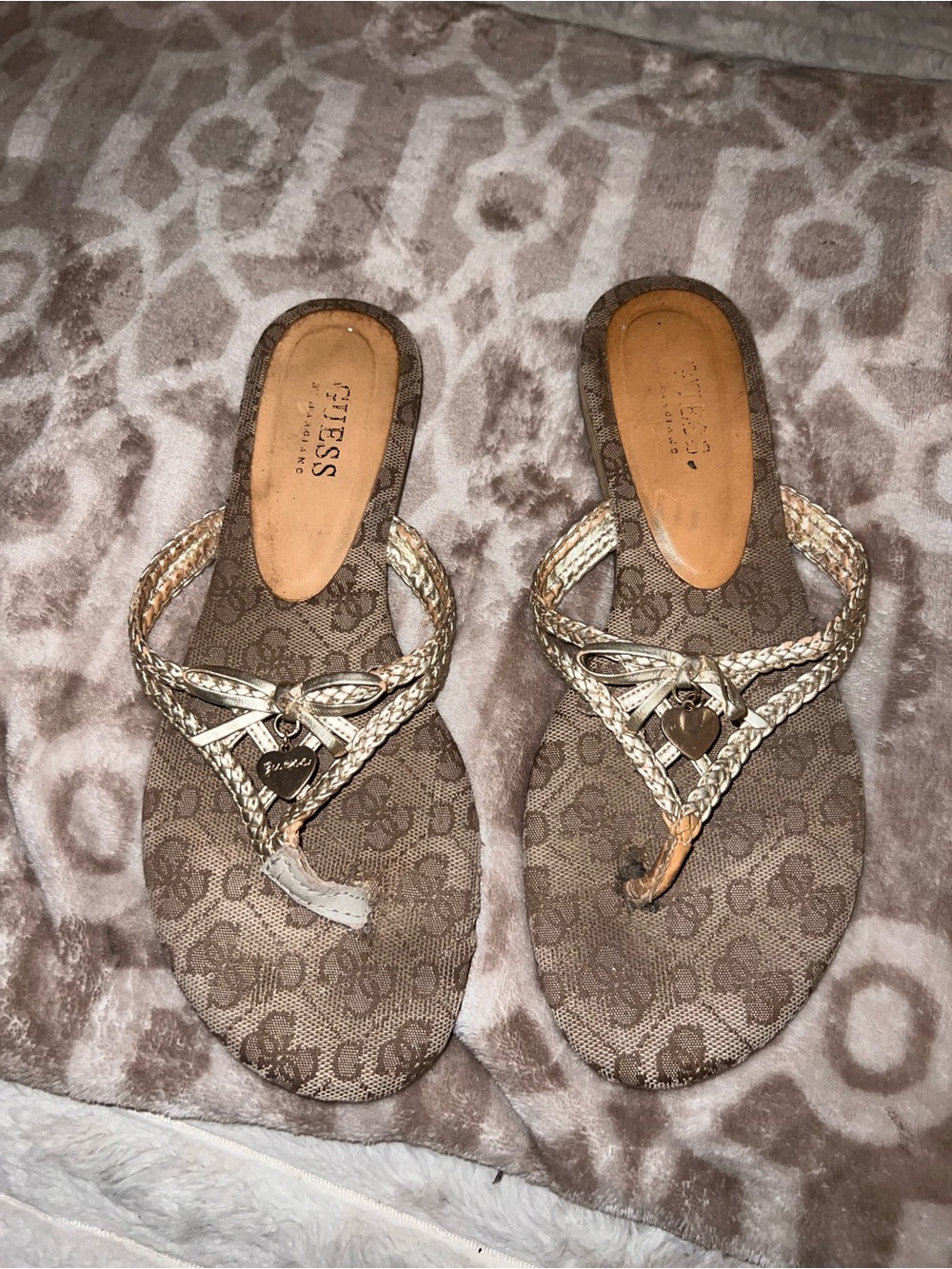 Guess Metallic Gold Braided Thong Sandals with Heart Charm